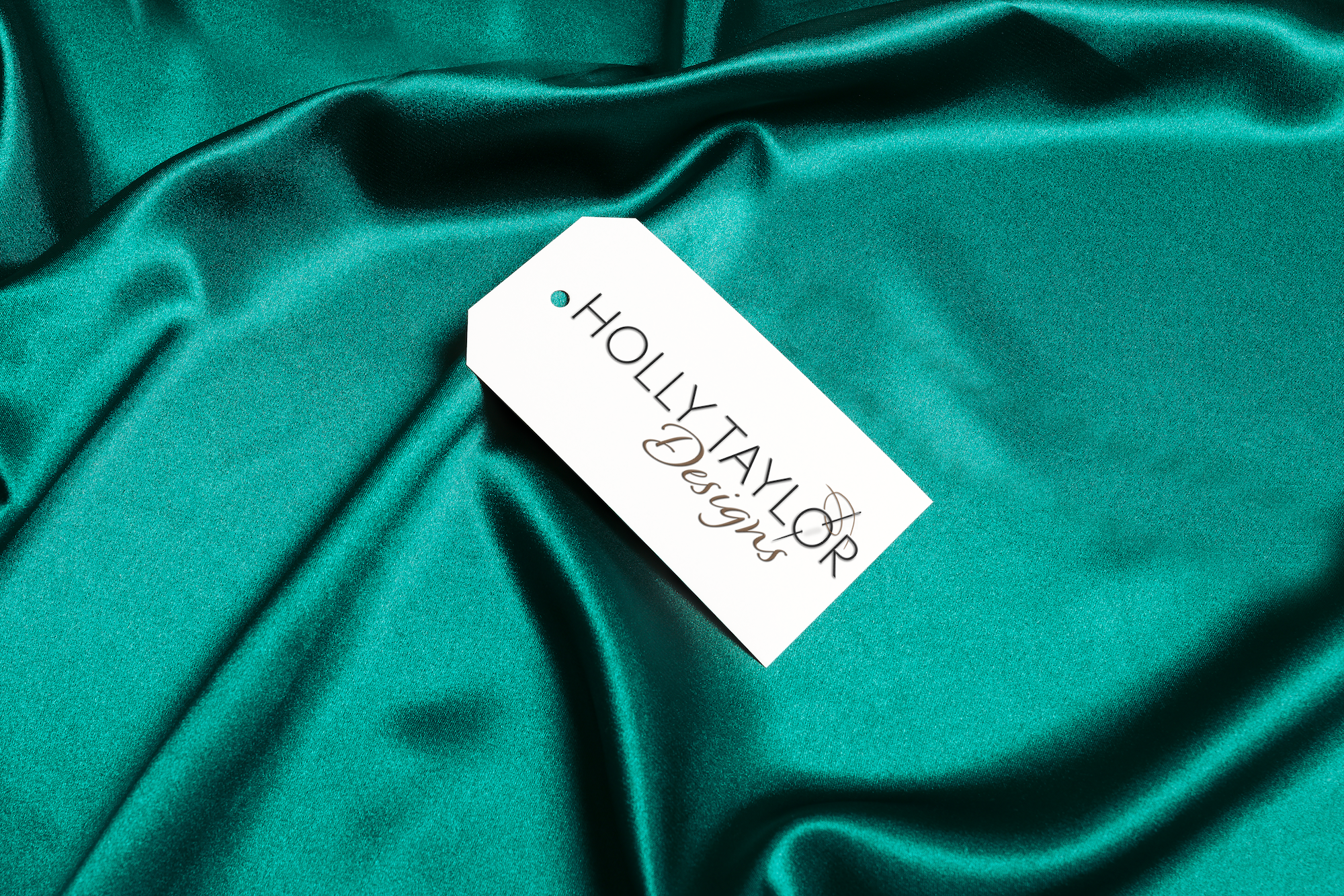 Holly Taylor designs logo displayed on fabric