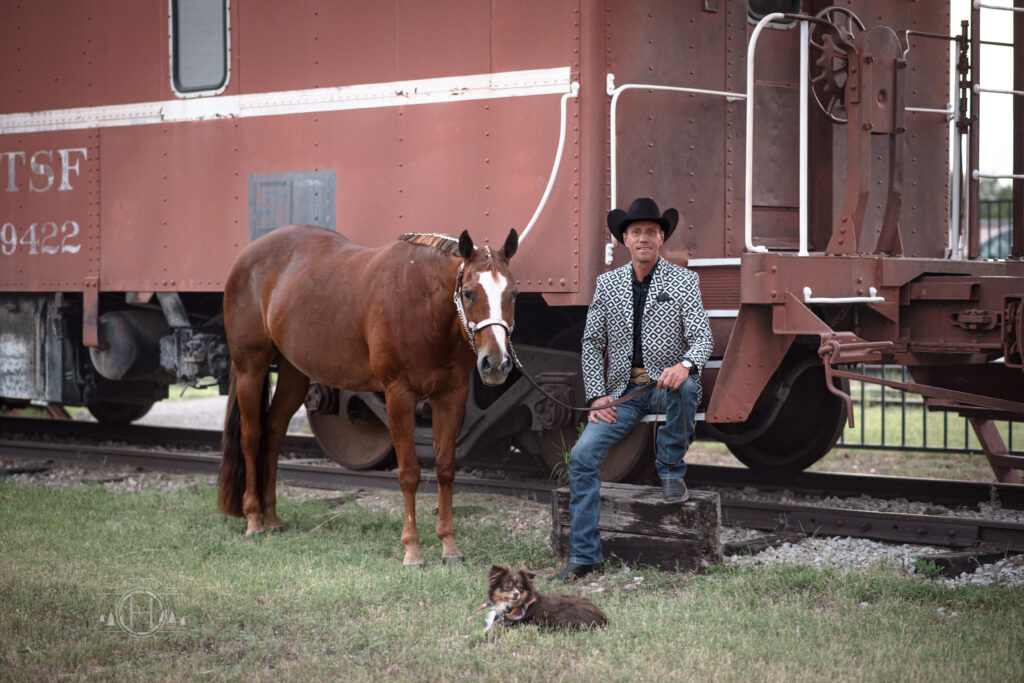 Man sitting on train for portrait that is included in the power of equestrian friendships